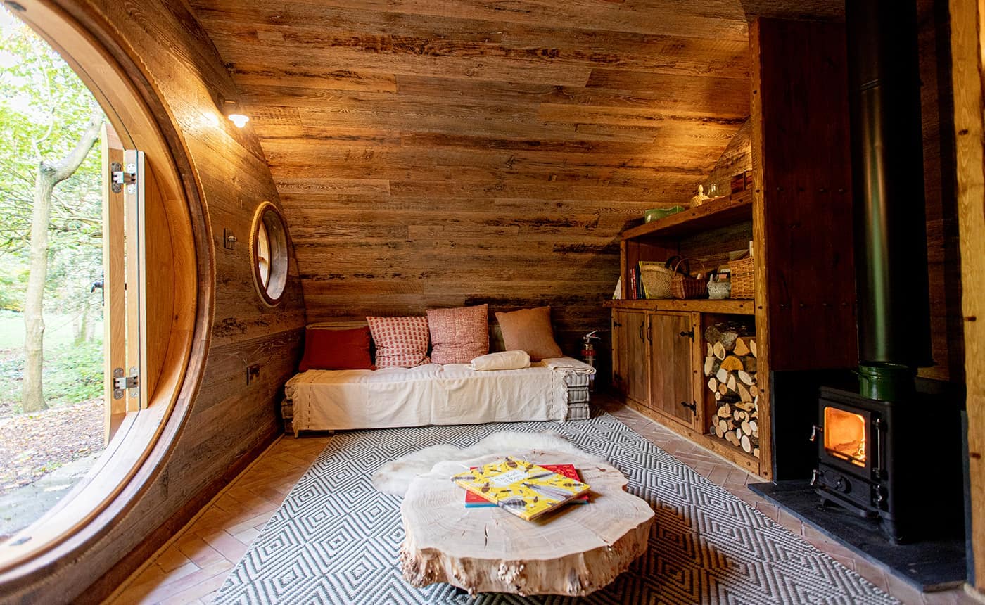 Hobbit small wood burning stove installed in a cabin designed by Blue Forest 2